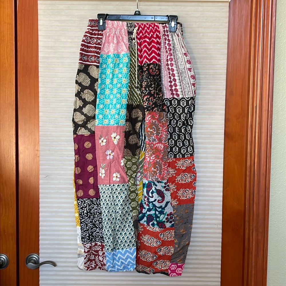 NWT Patchwork Multicolor Pants will fit medium to large waist is 14in w/pockets